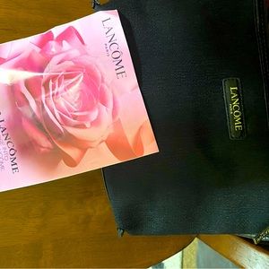 This is. Lancôme makeup bag. BRAND NEW never used with the makeup included